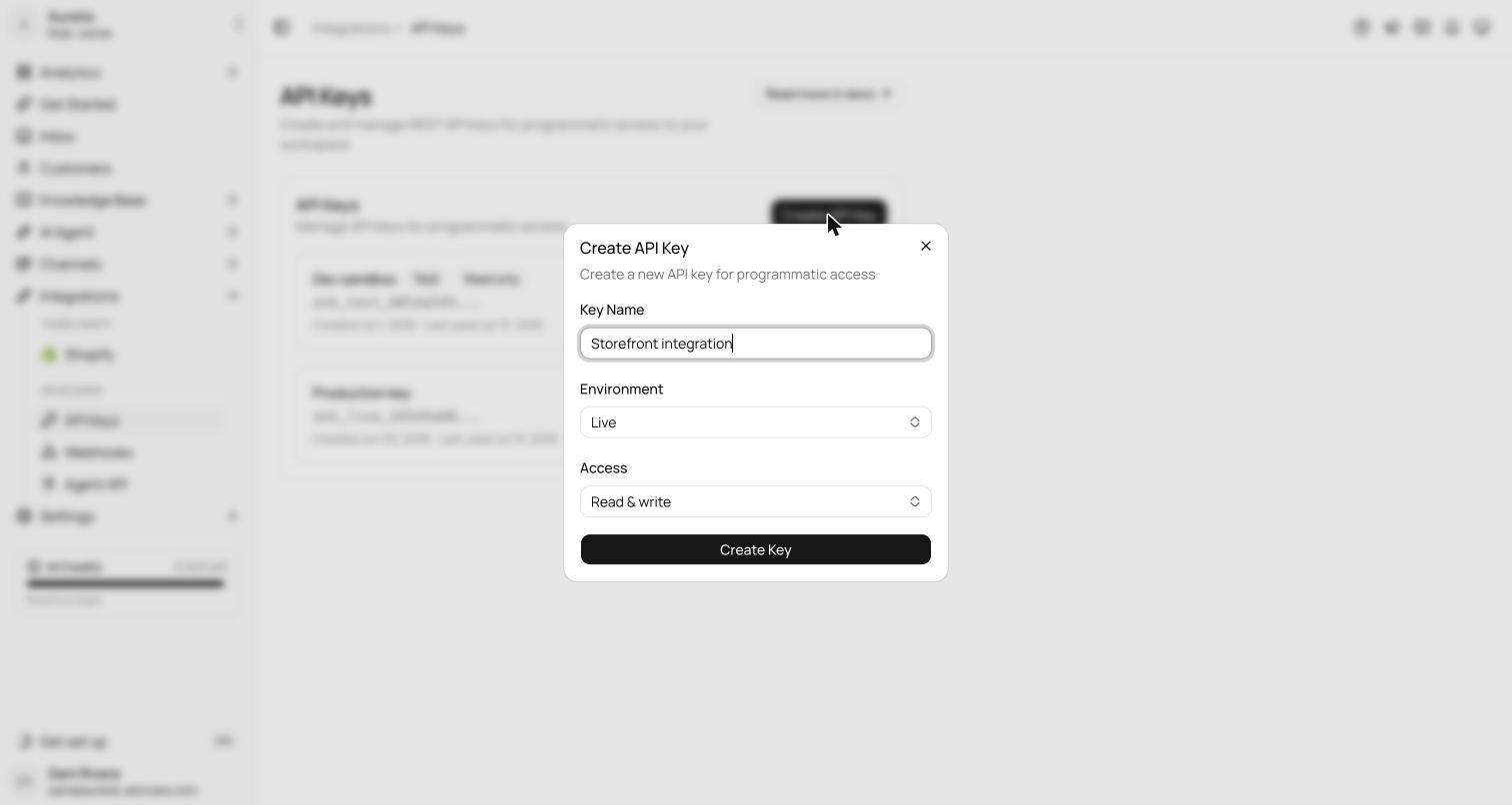 /integrations/api-keys page with the Create API Key dialog open, showing the Key Name field, Environment set to Live, and Access set to Read & write