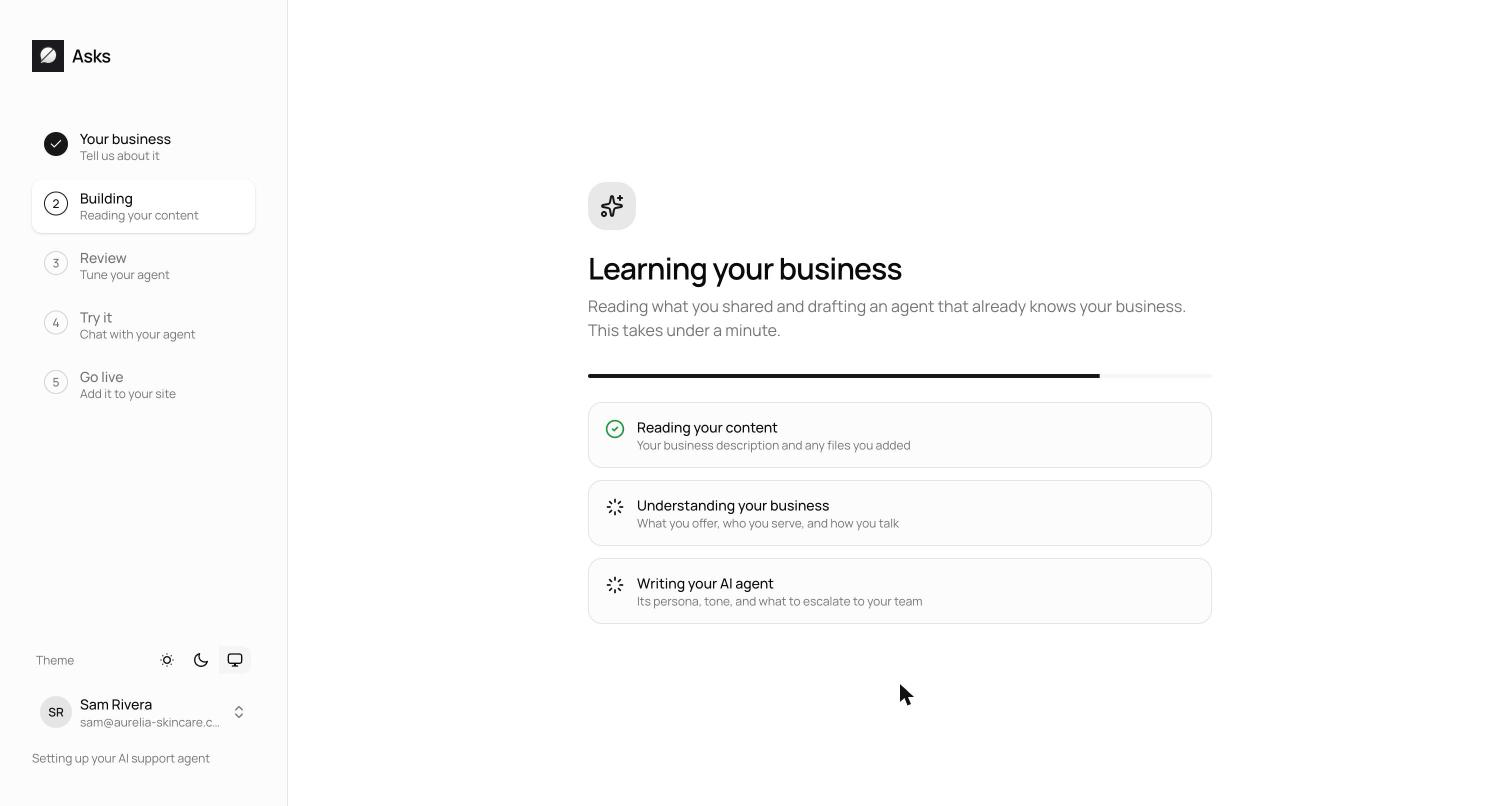 Onboarding building step showing the progress bar and three phases: reading your content, understanding your business, and writing your AI agent